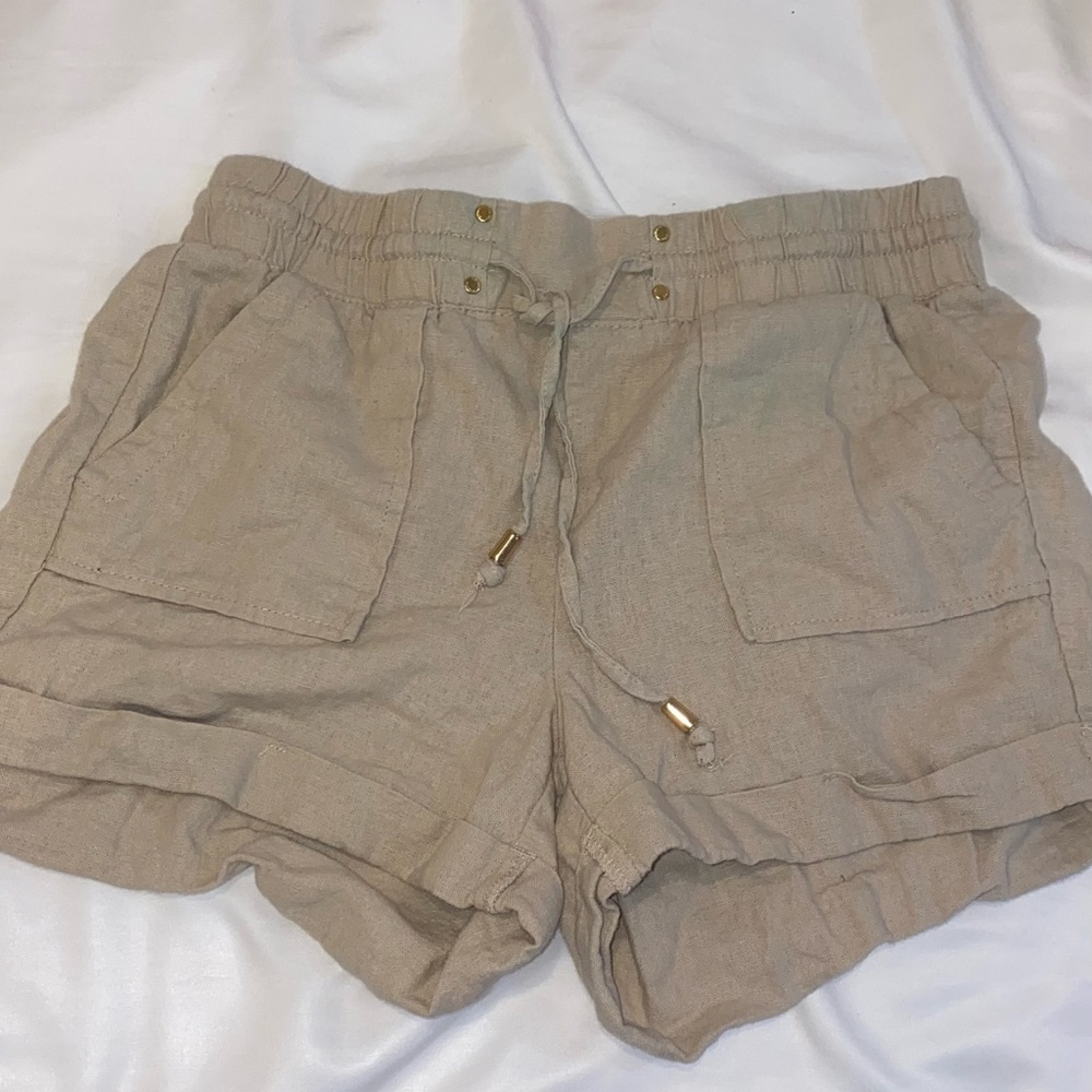 cream and gold shorts